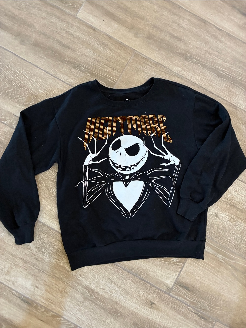 Disney Black Sweatshirt with White Jack Skellington and Orange 'NIGHTMARE' Text
